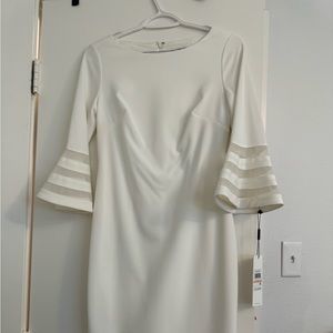 Calvin Klein white dress never worn still has the tags on it